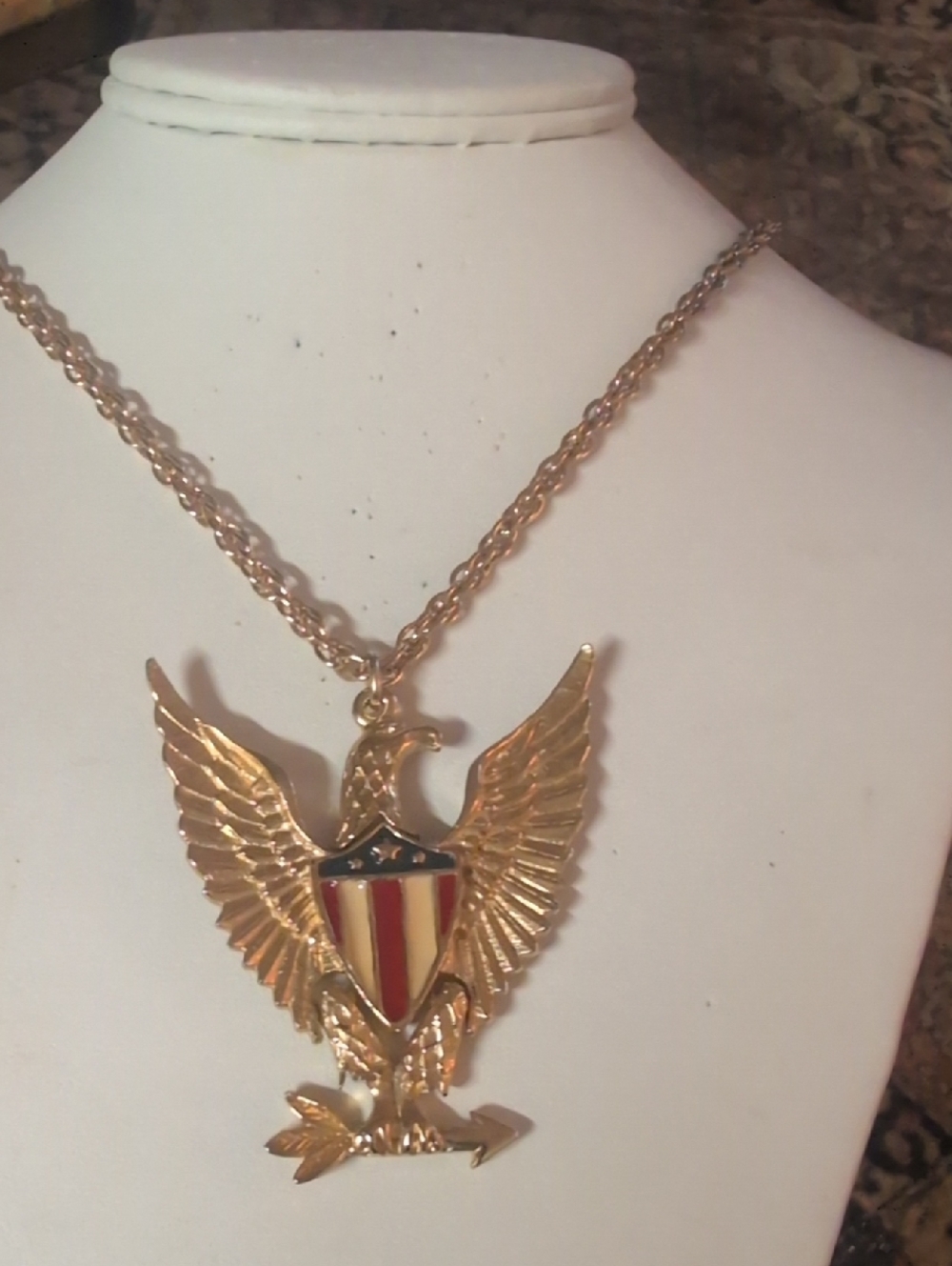 Articulated Gold-Tone Eagle Pendant Necklace with Red & Cream Enamel Shield